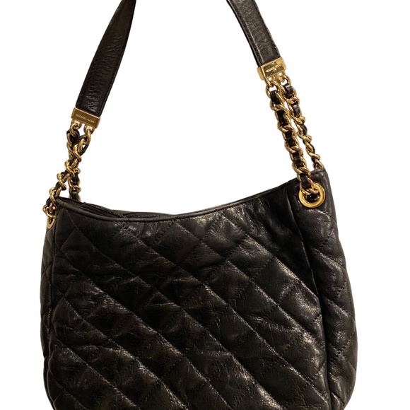 Authentic Michael Kors Lamb skin quilted handbag. - Picture 3 of 13